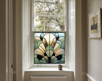 May include: A stained glass window with a geometric design in shades of blue, green, and gold. The window is set in a white frame and is surrounded by white trim.
