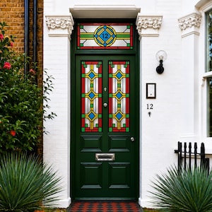 May include: A dark green front door featuring stained glass panels with red, yellow, and blue geometric patterns. The door includes a silver letter slot, a round knob, and a transom window above displaying the number 12 in a circular frame.