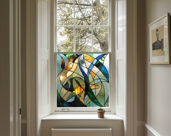 May include: A stained glass window with a colorful abstract design featuring blue, green, yellow, and white. The window is set in a white frame and is surrounded by white trim.
