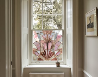 May include: A window with a stained glass design featuring pink, gold, and white geometric shapes. The window is framed in white and has a white windowsill. A small potted plant sits on the windowsill.