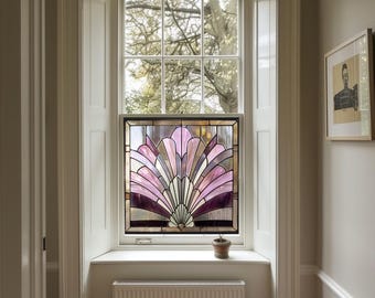 May include: A stained glass window featuring a pink and purple geometric design. The window is set in a white frame and is surrounded by white trim.
