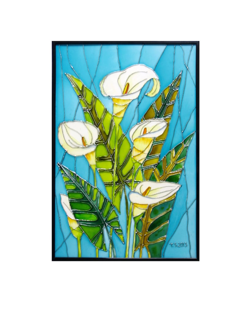 May include: A framed stained glass artwork featuring white calla lilies with green leaves on a blue background. The artist's signature and date, "Y.S. 2013", is visible in the bottom right corner.