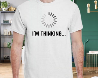 May include: White t-shirt with a black loading icon and the text "I'm thinking..."
