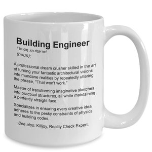 May include: White ceramic coffee mug with a black and white design. The mug features a definition of a building engineer, describing them as a "professional dream crusher" who turns "fantastic architectural visions" into "mundane realities".