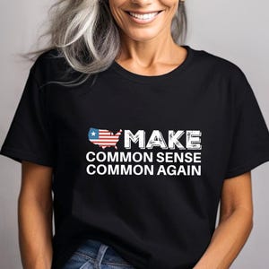 May include: Black t-shirt with a white graphic of a stylized American flag and the text "MAKE COMMON SENSE COMMON AGAIN".