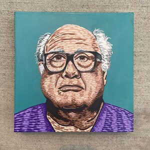 May include: A painting of a man with white hair and glasses wearing a purple shirt against a teal background.