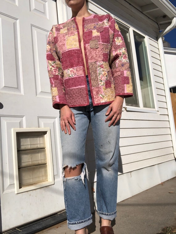 Homemade patchwork quilt style open sweater.