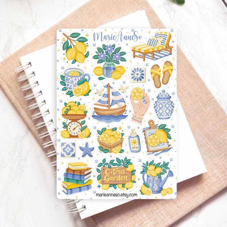 May include: A sticker sheet featuring various lemon-themed illustrations. Designs include lemons, a sailboat, a teacup, a lounge chair, and the text "Citrus Garden". The sticker sheet is on a white background.
