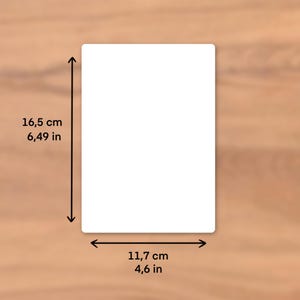 May include: A white rectangular product with rounded corners, measuring 16.5 cm in height and 11.7 cm in width. The dimensions are indicated by black arrows. The product is set against a wooden background.
