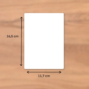 May include: A white blank card measuring 11.7 inches by 16.5 inches.