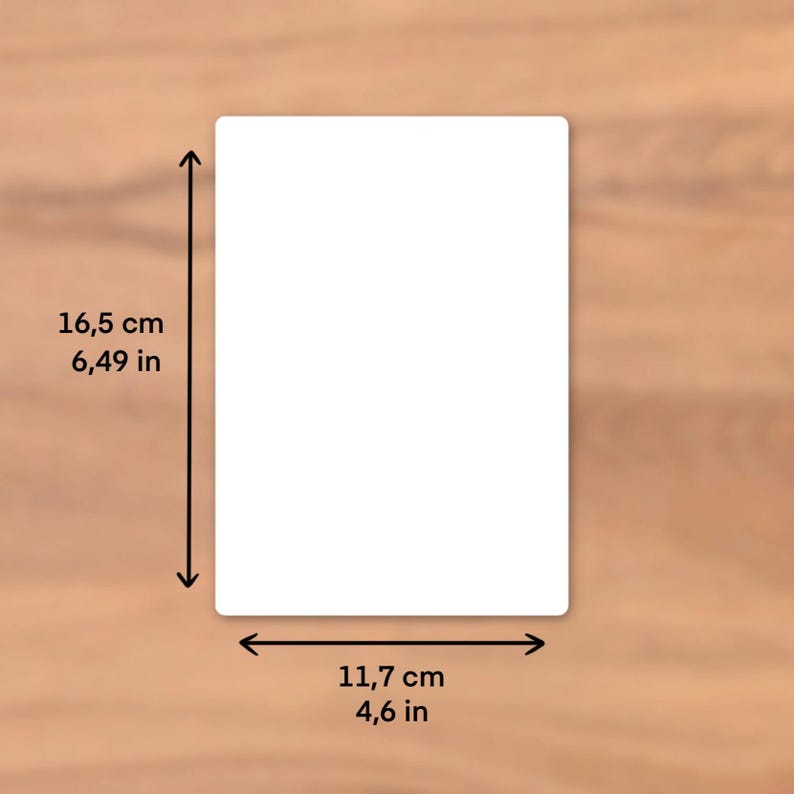 May include: A white rectangular product with rounded corners, measuring 6.49 inches in length and 4.6 inches in width. The dimensions are indicated by black arrows. The background is a light brown wooden surface.