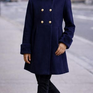 Elegant girls coat sewing pattern with pleated skirt