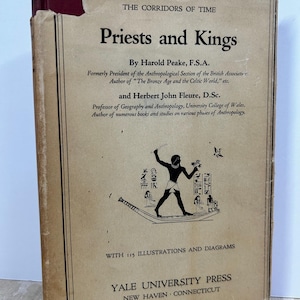 May include: A vintage book cover with a brown background and black text. The title is "Priests and Kings" by Harold Peake and Herbert John Fleure. The book cover features a black and white illustration of an Egyptian hieroglyphic scene with a man in a boat.