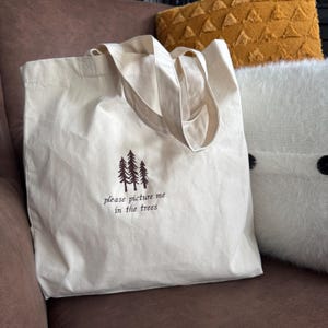 please picture me in the trees seven folklore inspired embroidered tote bag