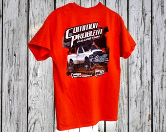 COMMON PROBLEM Pulling Team Vintage T Shirt | Orange and Black Size Men's Large