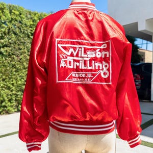 WILSON DRILLING Vintage Bomber Jacket Size Large (Albion, Illinois) | Red w/ White Trim & Print ( Vintage Varsity Bomber Jacket)