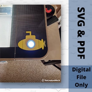 May include: A yellow submarine with a black outline and a white light inside. The submarine is on a black and white background with a black border.