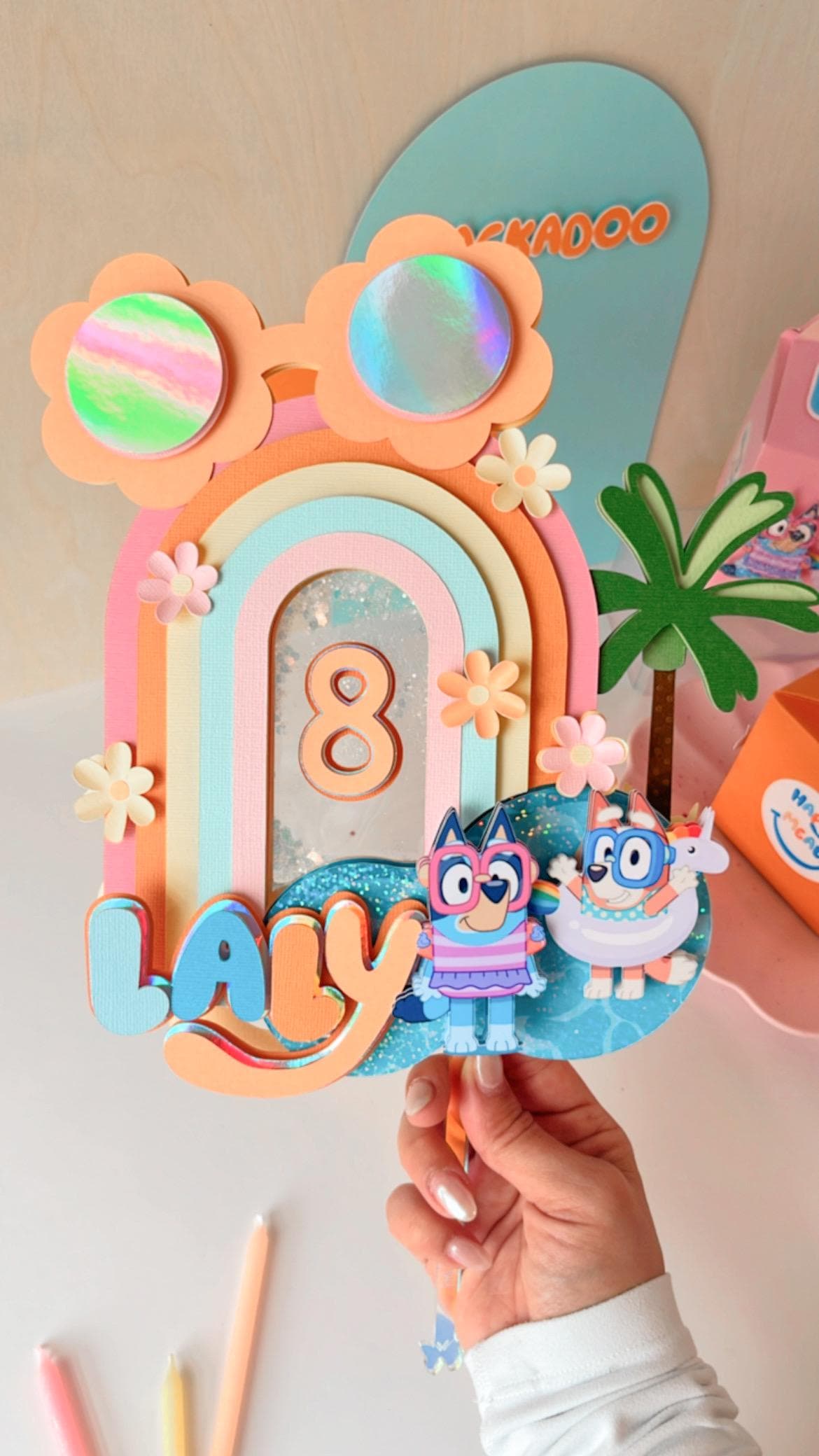 Blue and orange dog cake topper