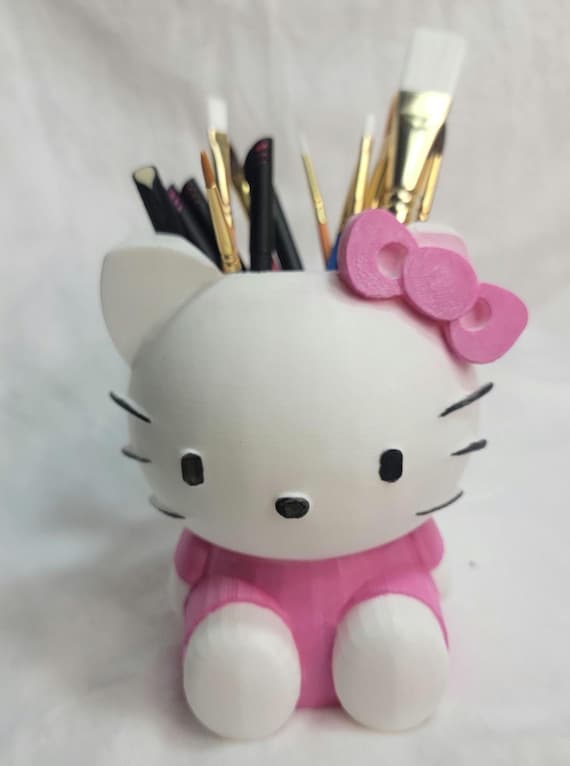 Hello Kitty Desktop organizer for pens, pencils, markers, paint brushes, & more Free UV Decal/sticker with Purchase