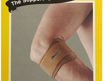 Pode incluir: Um suporte de cotovelo de tênis marrom feito de neoprene com o texto "Perfect" impresso nele. O suporte é mostrado no braço de uma pessoa. A embalagem do produto inclui o texto "Tennis Elbow Support Neoprene", "London Joints Care" e "The Support "U" Can Trust".
