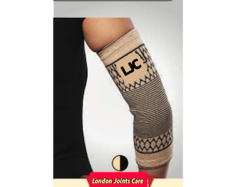 Pode incluir: Suporte de cotovelo bege com padrões geométricos em preto e branco. O suporte tem as letras "LJ" em um quadrado preto no lado. O texto "London Joints Care" e "S/M/L/XL" está impresso abaixo da imagem.