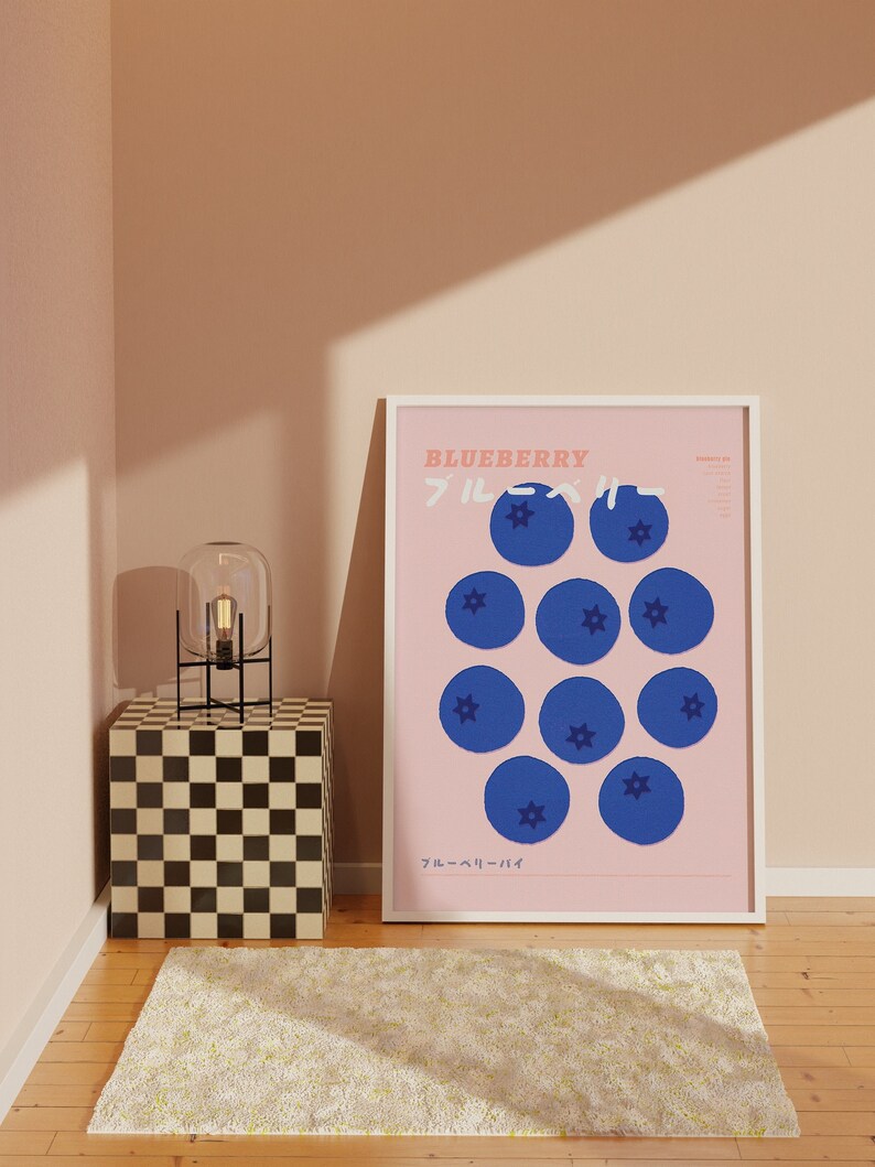 May include: A white framed poster with a pink background and blue blueberries. The poster has the text "Blueberry" and "ブルーベリー" in Japanese.