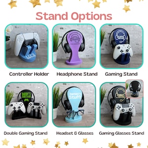 May include: A set of six different stands for gaming controllers, headphones, and glasses. The stands are made of wood and are painted in various colours, including blue, purple, and black. Each stand features a personalised design with text and graphics. The stands are a great way to organise and display your gaming gear.