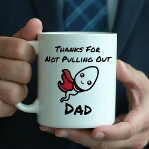 Cheeky Fathers Day Coffee Mug, Rude Gift for Him. Ceramic Dishwasher Safe Novelty Mug. &#39;Thanks For Not Pulling Out Dad&#39;