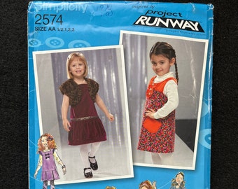 Simplicity Sewing Pattern 2574 Project Runway Toddlers' & Child's Jumper Skirt Shrug Size 1/2-3 FF UNCUT