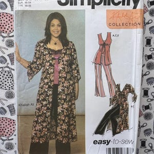 May include: A Simplicity 5075 sewing pattern envelope for the Khaliah Ali Collection, size BB 20W-28W. The front shows a model wearing a floral duster coat over a pink top and black pants, with illustrations of the garments and a barcode.