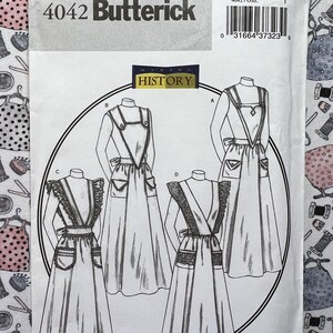 May include: A vintage Butterick sewing pattern packet, featuring line drawings of historical dresses. The packet is white with black text and illustrations, including the number 4042. The words "Making History" are also visible.