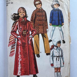 May include: Vintage Simplicity sewing pattern featuring illustrations of children's coats. The pattern includes a maxi-length red coat, a plaid coat, a blue coat, and a white coat. The pattern is size 7, breast 26.