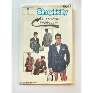 May include: A Simplicity Connoisseur Collection sewing pattern envelope, number 6667, size 42. The front features illustrations of various blazers and suits, including a double-breasted navy blazer with a bow tie and a plaid jacket, on a cream background.