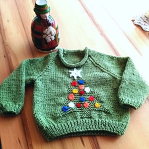 Hand knitted Christmas tree and lights child's jumper.