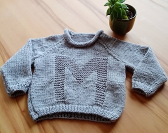 1-2yrs hand knitted jumper with motif.