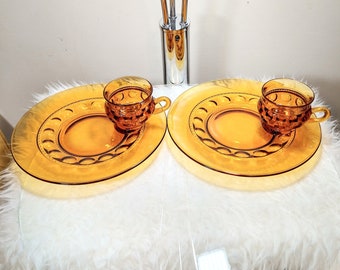 Large vintage amber glass kings crown thumbprint snack set, tea cup and plate set, mid century matching set of dinnerware