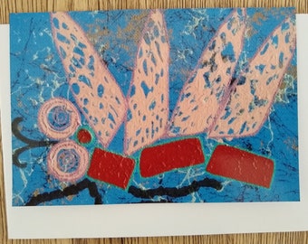 May include: A colourful abstract painting of a butterfly with pink wings and red accents on a blue background.
