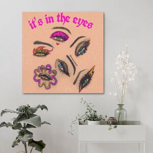 May include: A digital illustration of various eyes with different makeup styles and colors. The text "it's in the eyes" is written in pink letters at the top of the image.