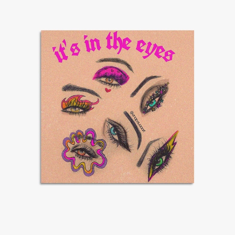 May include: A digital illustration of multiple eyes with different makeup styles and colors. The text "it's in the eyes" is written in pink letters at the top of the image. The artist's social media handle is written in the bottom right corner of the image.