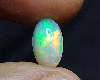 0.80 Carat Ethiopian Opal Cabochon: AAA+ Fire Opal Gemstone Size (9X5X3MM)