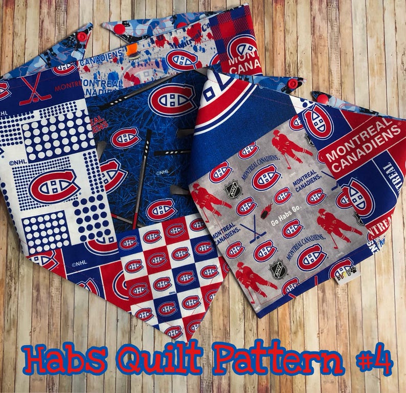 May include: A collection of Montreal Canadiens-themed fabric pieces. The fabrics feature the team's logo, hockey sticks, and the words "Montreal Canadiens." The color scheme includes red, white, and blue. The text "Habs Quilt Pattern #4" is also visible.