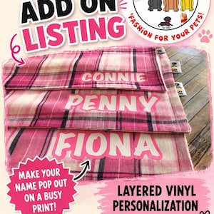 May include: Three pink plaid pet bandanas featuring layered vinyl personalization with the names Connie, Penny, and Fiona in white lettering. The image includes text overlays such as VINYL ADD ON LISTING, LAYERED VINYL PERSONALIZATION, and a logo with three dogs.