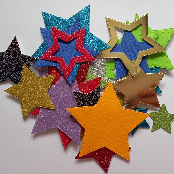 Stars, Balloons and Hearts die cut out of various shades, designs, sizes and  texture of card. There are 30 in each package.