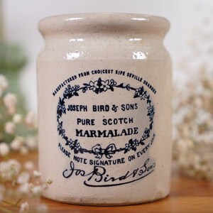 lovely sage green embossed honey.preserve or marmalade pot vintage Lord Nelson pottery and Wyncraft hopefully in its original wooden stand