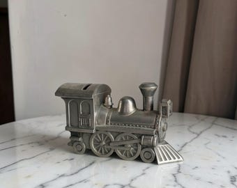 Vintage locomotive coin bank, made in Hong Kong , 1970’s , silver plated