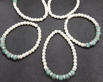 jade and pearl bracelets with silver rings