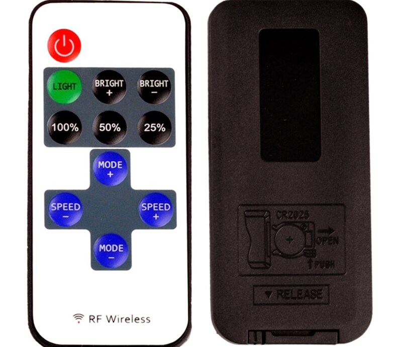 May include: A white remote control with a black and gray button layout. The buttons are labeled with functions such as "Light", "Bright", "Mode", and "Speed". The remote control also has a power button and a battery compartment. The remote control is used to control a device, such as a light or fan.