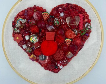 Red hand stitched bead heart embroidery
