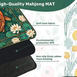May include: A high-quality Mahjong mat with a detailed design featuring a koi fish, water lilies, and a green and gold border. The mat has a soft tech fabric, environmental protection XPE, and a non-slip thick rubber foam backing.