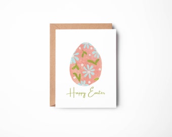 May include: A pink Easter egg card with a floral pattern in shades of green, blue, and white. The card has the text "Happy Easter" in green.